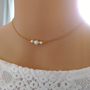 Collier avec bijou de dos en perles nacrées blanches et strass pour robe de mariage dos nu