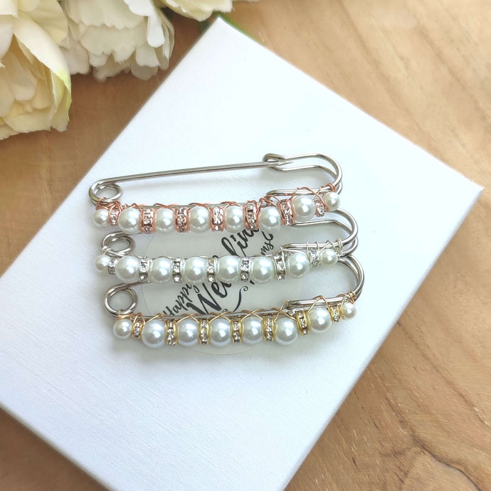 Epingle broche remonte traîne en perles et strass pour robe de mariée