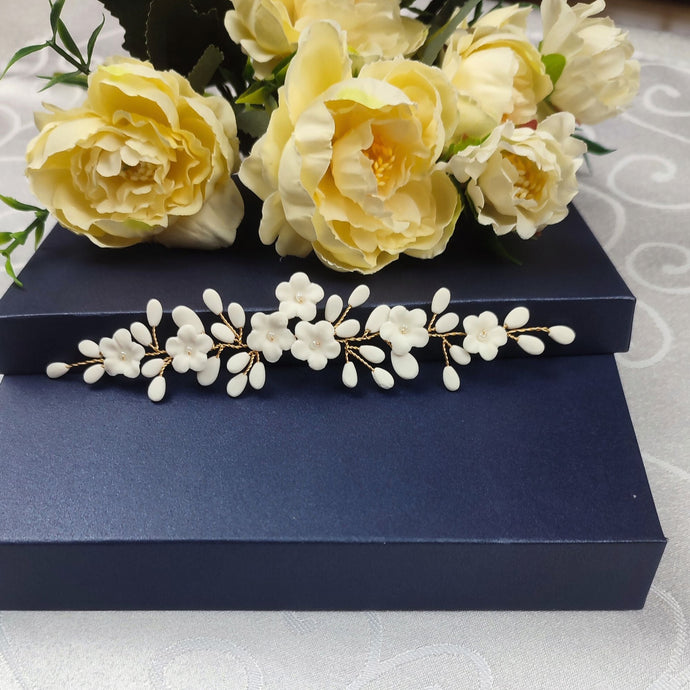 Bijou de cheveux floral en porcelaine froide pour chignon ou coiffure de mariage