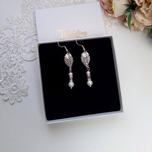 Boucles d'oreilles pendantes avec perles, cristal, strass et feuilles argentées pour mariage bohème ou rustique