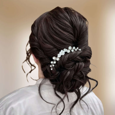 Petit bijou de cheveux sur épingle à chignon en perles nacrées et fleurs blanches pour coiffure de mariage ou soirée