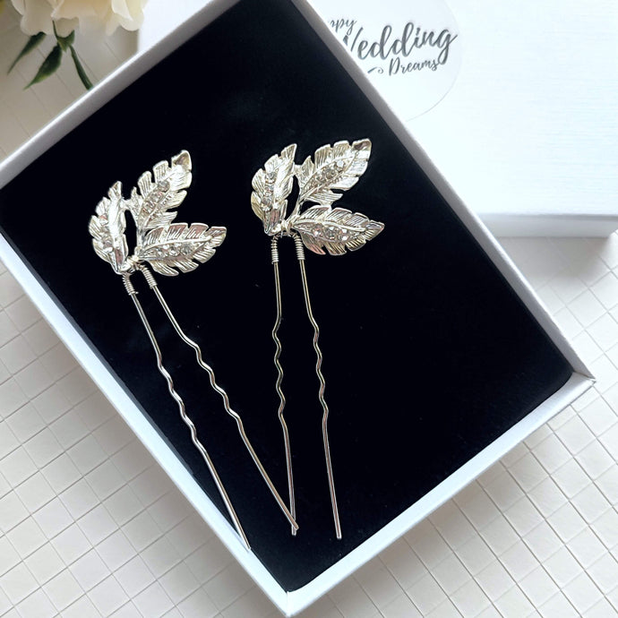 Lot de 2 épingles à chignon avec feuilles argentées et strass pour coiffure de mariage ou soirée