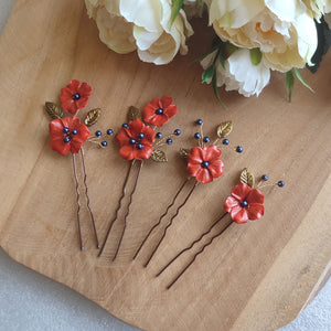 lot d'épingles à cheveux avec fleurs oranges en porcelaine froide, feuilles bronze et perles bleu foncé pour coiffure bohème de mariage d'automne