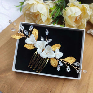 Bijou de cheveux Peigne style bohème pour coiffure de mariage avec cristal, strass, fleurs blanches et feuilles dorées en porcelaine froide