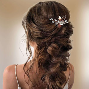 Petit bijou de cheveux floral avec cristal et strass transparents et feuilles or rose monté sur épingle à chignon pour coiffure de mariage